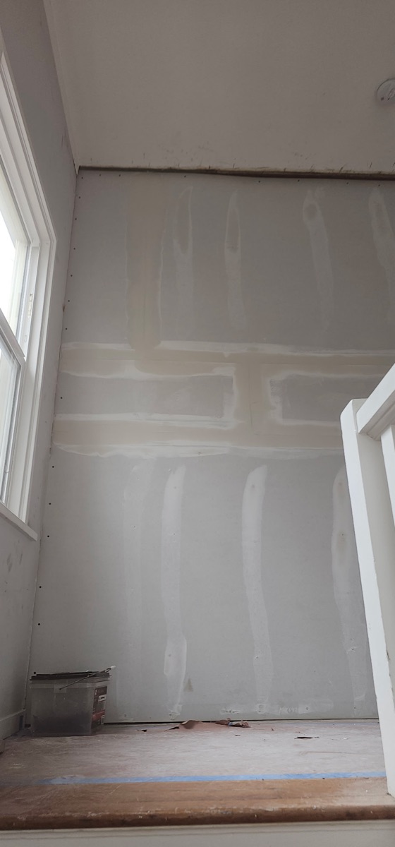 Drywall taping tall wall