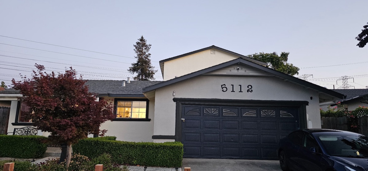 Exterior painted house at dusk