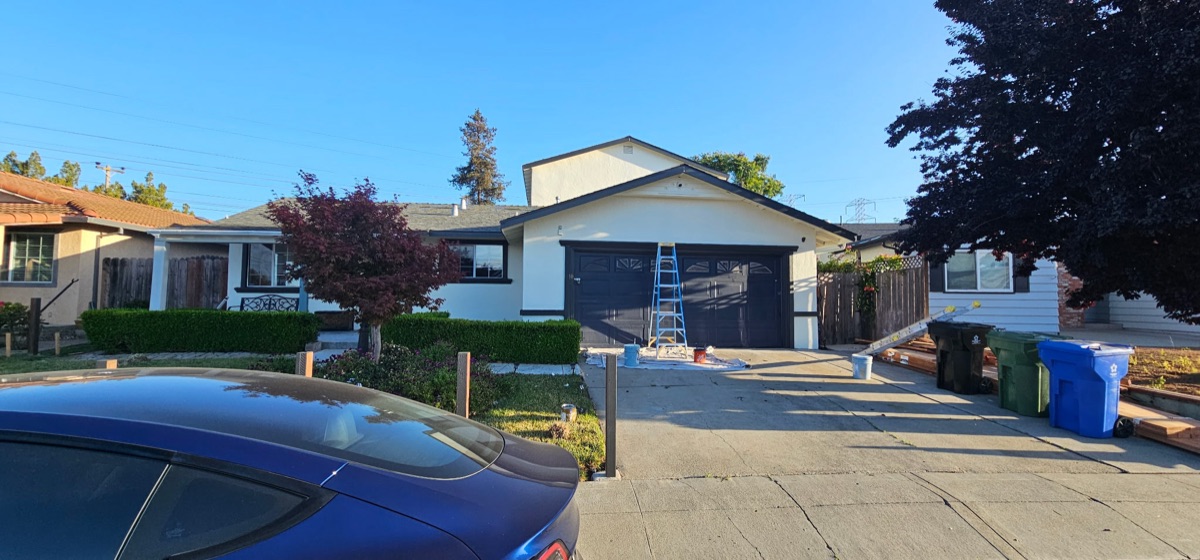 Exterior house painting in progress
